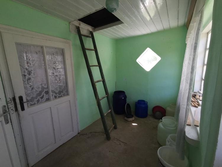 Casă individuală cu 2 camere cu Teren 1170 Mp în Central