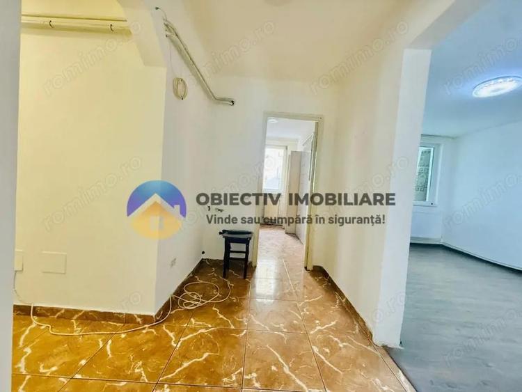 Apartament cu 3 camere decomandat în Est