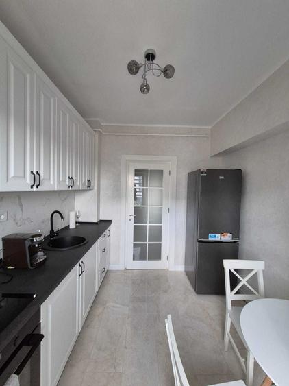 Apartament cu 2 camere decomandat în Rediu