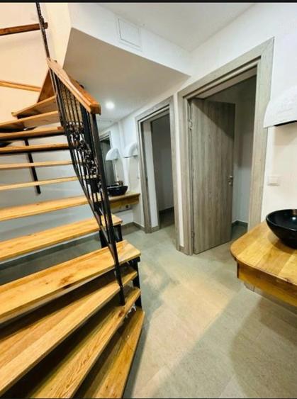 Casă cu Teren 750 Mp în Central