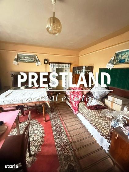 Casă cu 4 camere cu Teren 2424 Mp în Slimnic