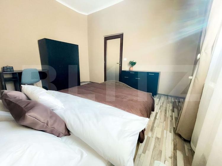 Apartament cu 2 camere semidecomandat, mobilat în Central