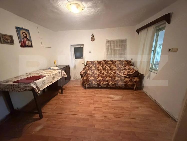 Casă cu 2 camere cu Teren 1400 Mp în Nușfalău