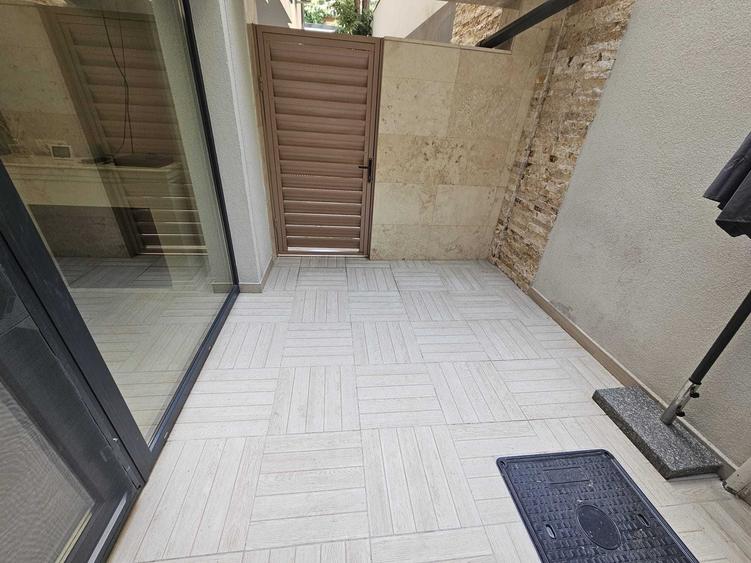2 camere la 50m de Piața Domenii: Design modern și terasă privată - 1