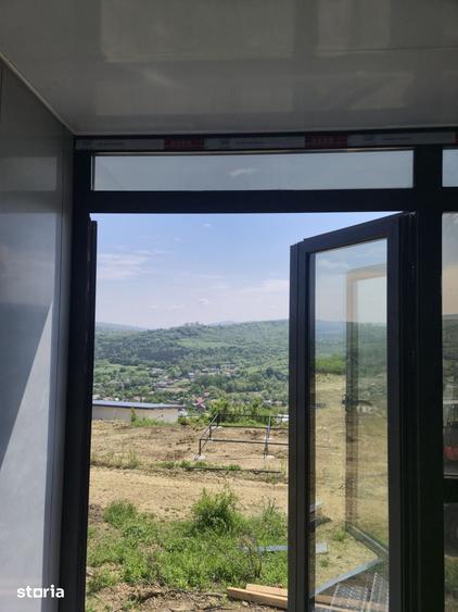 Casă cu 2 camere cu Teren 450 Mp în Tomești