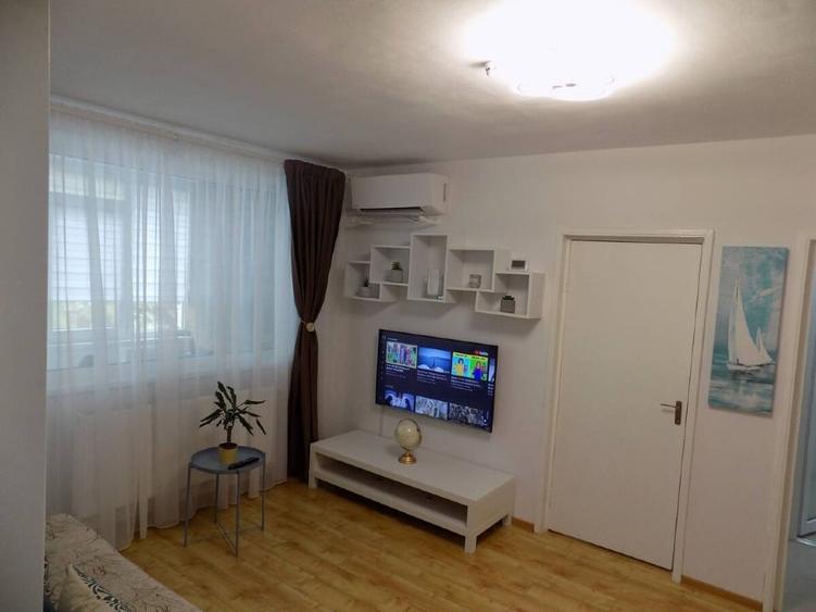 Apartament cu 3 camere semidecomandat, mobilat în Țiglina 2