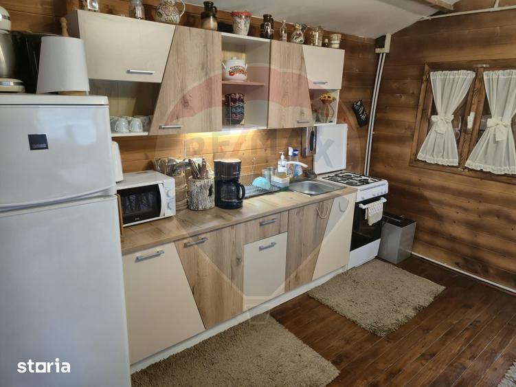 Casă cu 3 camere cu Teren 1268 Mp în Săpânța