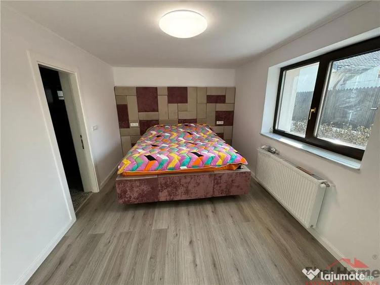 Cladire cu 3 apartamente in suprafata totala construita de 5 - 9