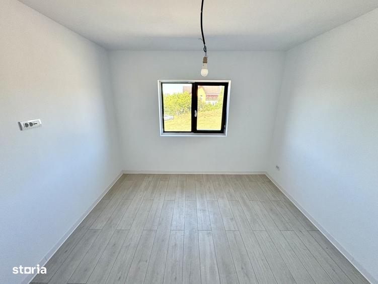 Casă cu 4 camere în Bucium