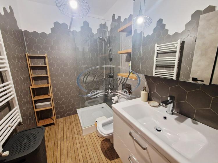 Apartament deosebit si cu parcare subterana in Borhanci - 9
