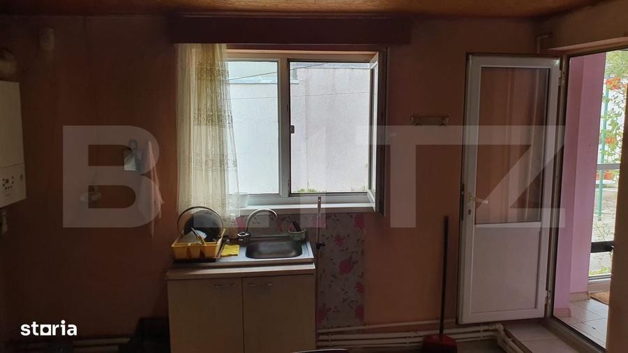 Casă cu 2 camere cu Teren 445 Mp în Piața Centrală