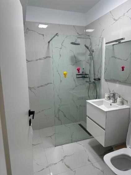 Apartament cu 2 camere semidecomandat, mobilat în Tunari