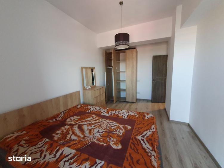 Apartament cu 2 camere semidecomandat, mobilat în Olteniței