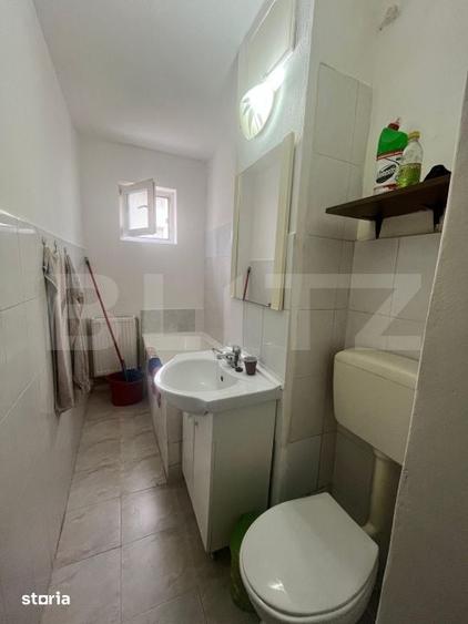 Apartament cu 3 camere semidecomandat în Central