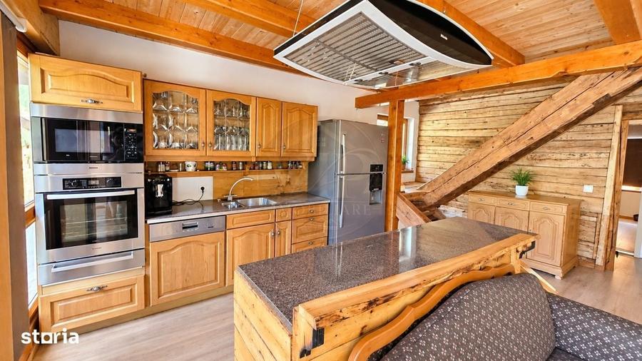 Casa de vacanta cu 3 camere,1500 mp teren,Intregalde - 4