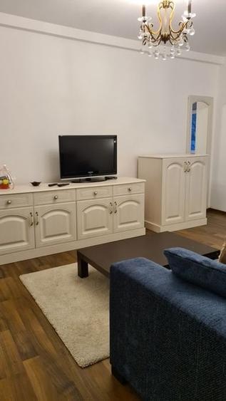 Apartament cu 2 camere semidecomandat, mobilat în Central
