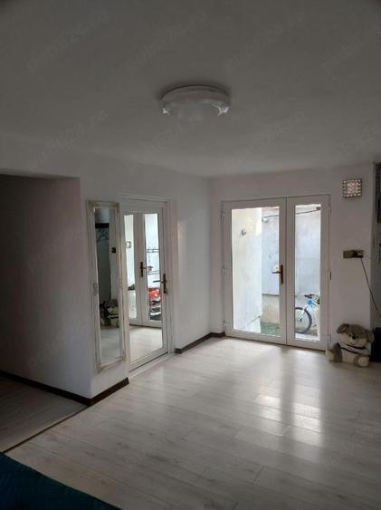 Casă cu Teren 1033 Mp în Central