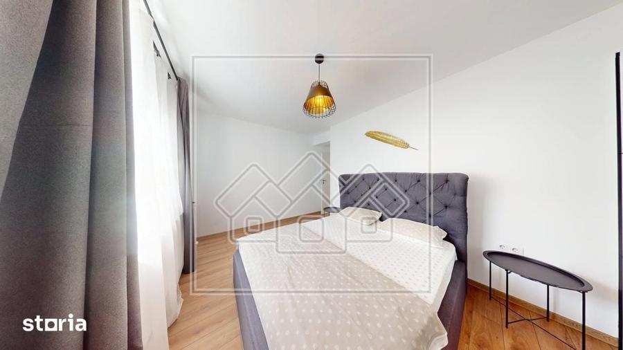Apartament modern, cu 3 camere, balcon mare, loc de parcare inclus - C - 10