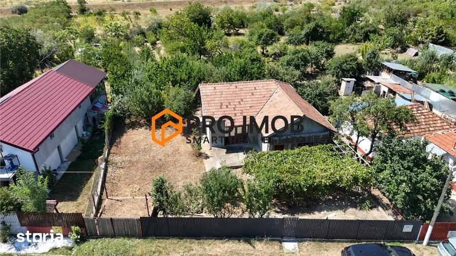Casă cu 3 camere decomandat cu Teren 1749 Mp în Berca
