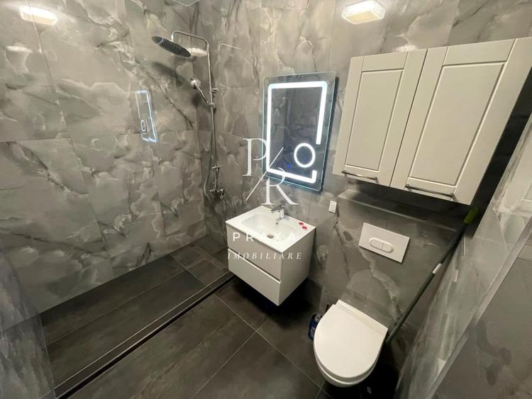 Apartament cu 2 camere semidecomandat, mobilat în Florești