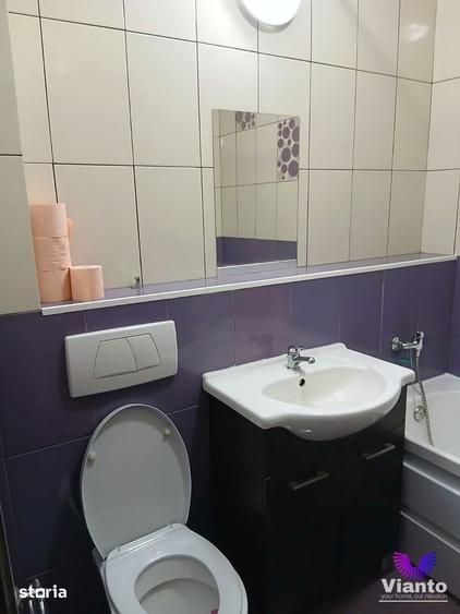 Apartament cu 2 camere semidecomandat, mobilat în Central