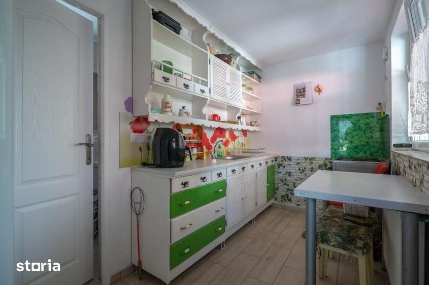 Casă cu 5 camere cu Teren 900 Mp în Burdea