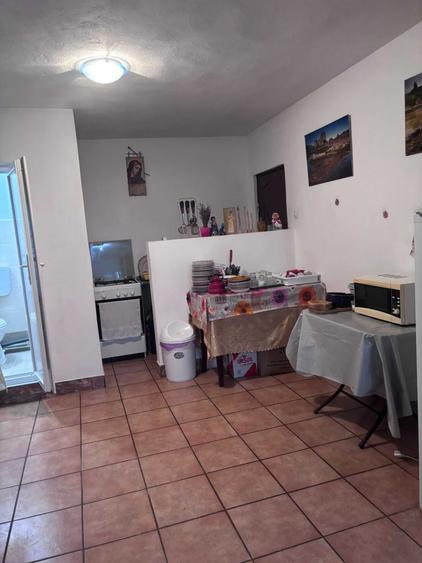 Casă cu 4 camere în Căpățânenii Ungureni