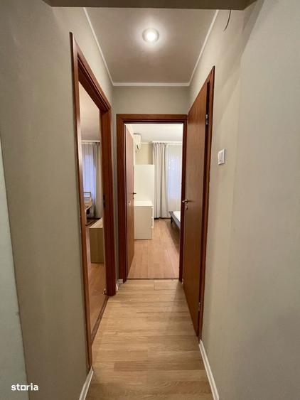 Apartament cu 3 camere decomandat în Romană