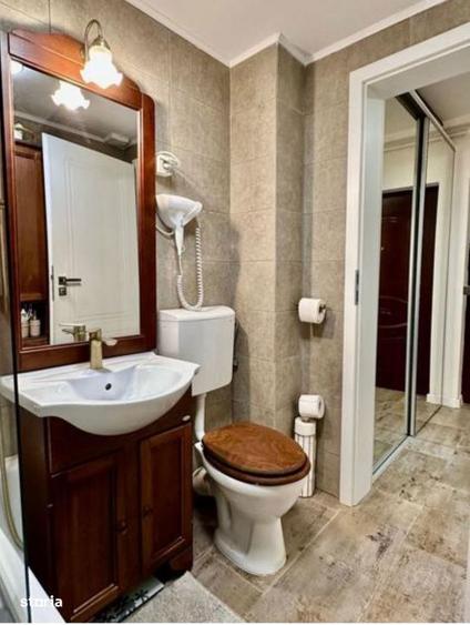 Apartament cu 2 camere semidecomandat, mobilat în Baicului