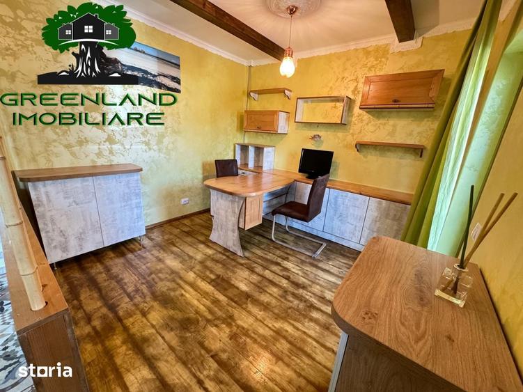 Apartament cu 7 camere decomandat în Bucium