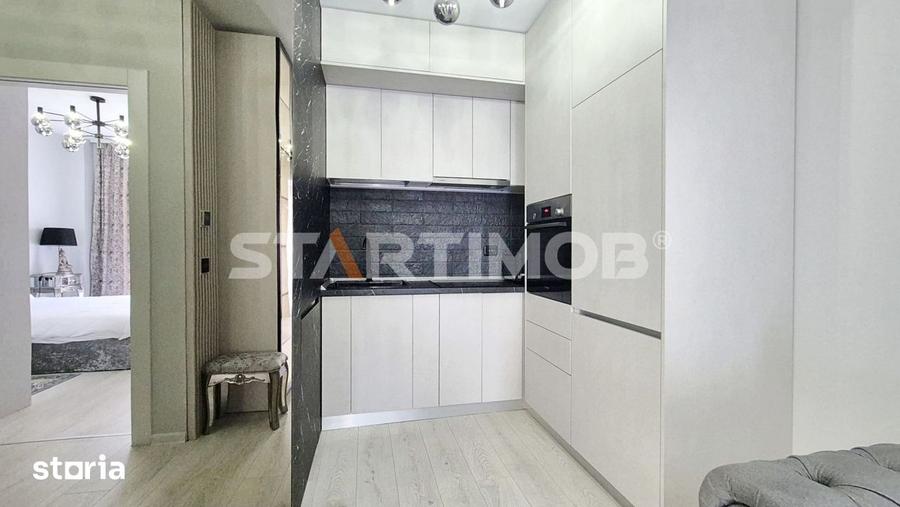 Apartament cu 2 camere, mobilat în Tractorul