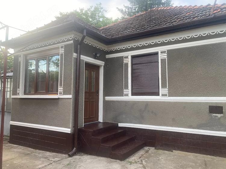 Casă cu 4 camere cu Teren 3000 Mp în Cuvin