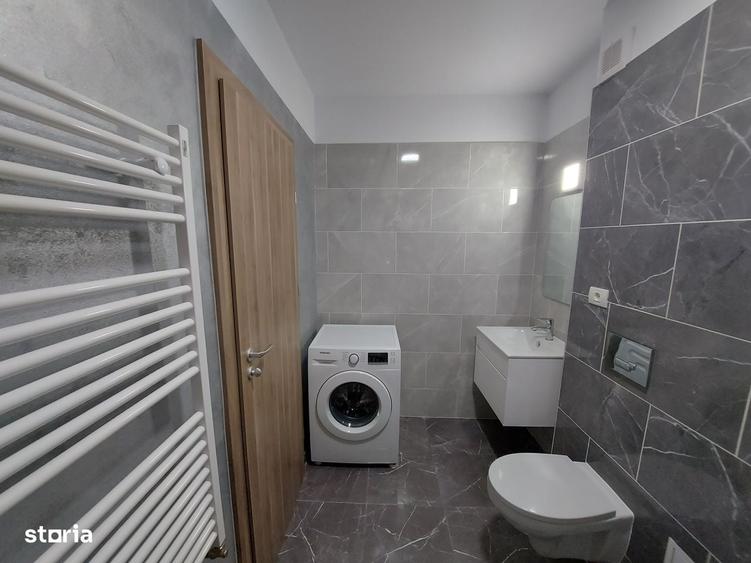 Apartament cu 2 camere decomandat în Tractorul