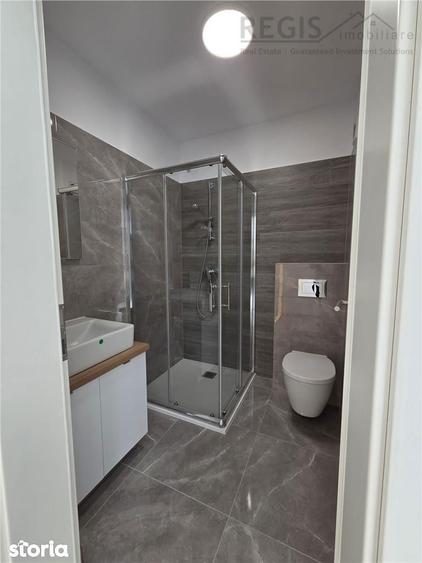 Apartament cu 3 camere decomandat, mobilat în Tractorul
