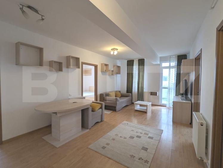 Apartament cu 3 camere semidecomandat, mobilat în Baciu