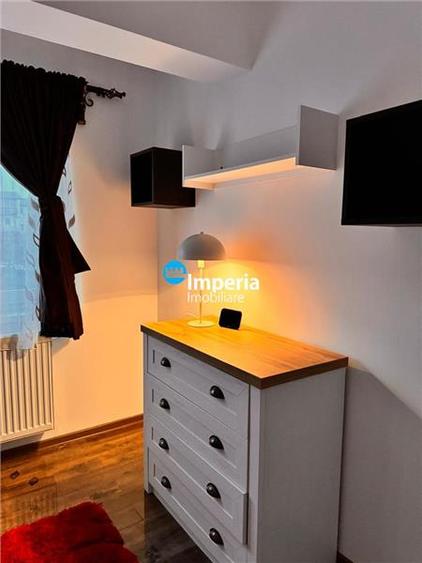 Apartament cu 4 camere decomandat, mobilat în Breazu