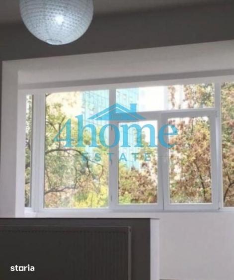 Apartament cu 3 camere în Romană