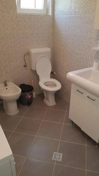 Casă cu Teren 900 Mp în Central