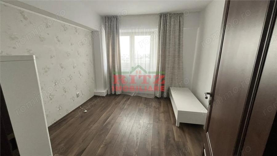 Apartament cu 3 camere decomandat în