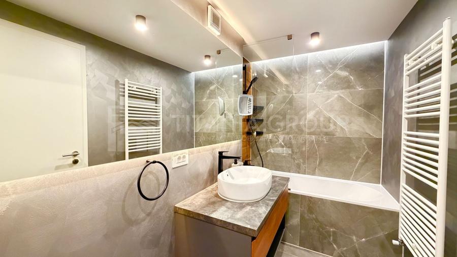 Apartament cu 4 camere decomandat, mobilat în Tractorul