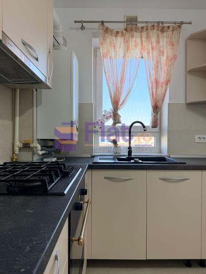 Apartament cu 2 camere decomandat în Tractorul