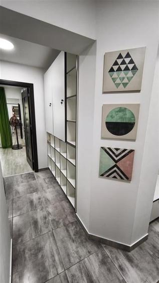 Apartament cu 2 camere decomandat, mobilat în Podul de Fier