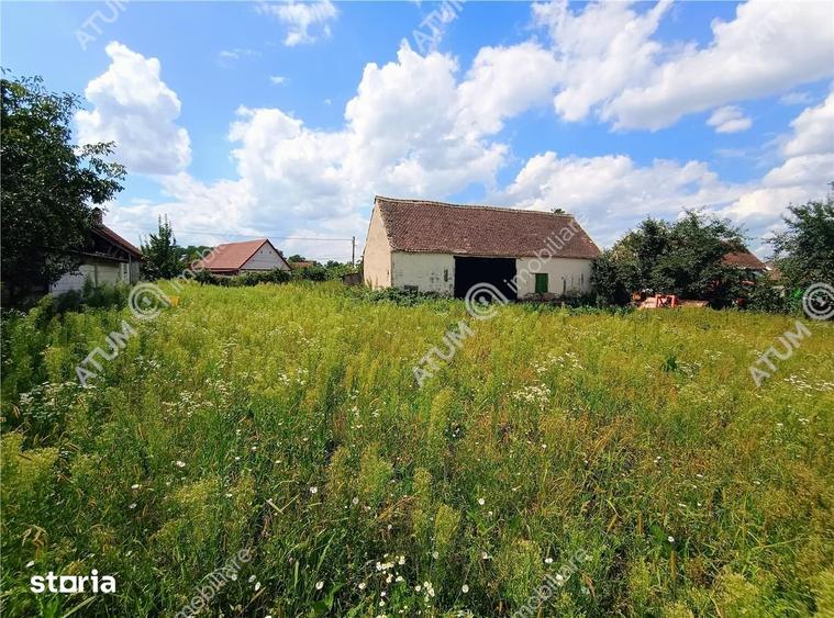 Casă cu 4 camere decomandat cu Teren 1650 Mp în Porumbacu de Jos