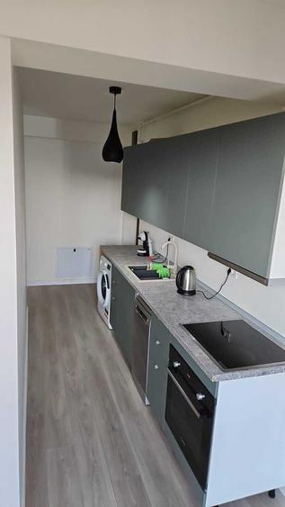 Apartament cu 2 camere semidecomandat, mobilat în Central