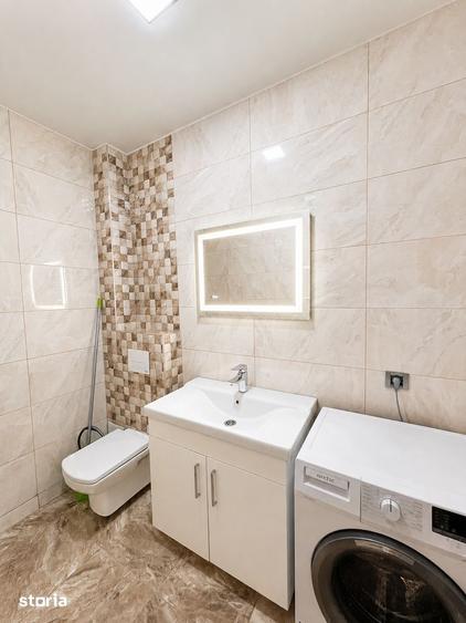 Apartament cu 3 camere decomandat în Tractorul