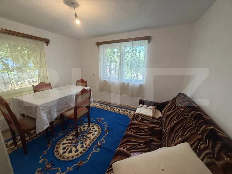 Casă cu 2 camere cu Teren 1400 Mp în Nușfalău