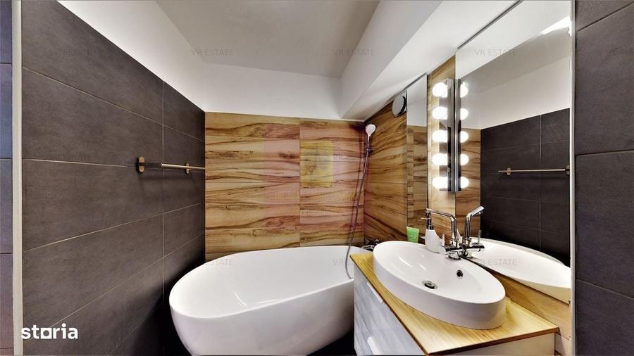 Apartament cu 3 camere în Romană