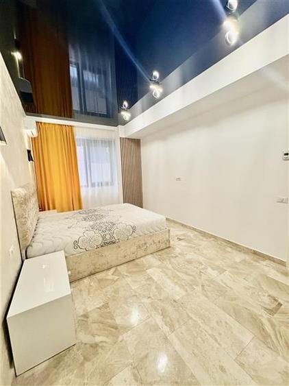 Apartament cu 2 camere decomandat, mobilat în Central