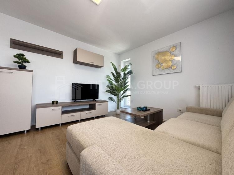 Apartament cu 2 camere semidecomandat, mobilat în Tractorul