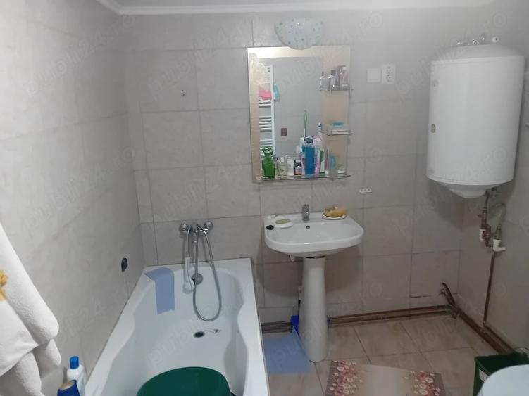 Casă cu Teren 1000 Mp în Bogdănești (Tomșani)